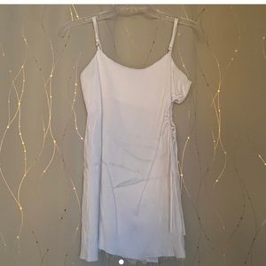 White mini dress from zara. Unique side asymmetric detail. No noticeable flaws.